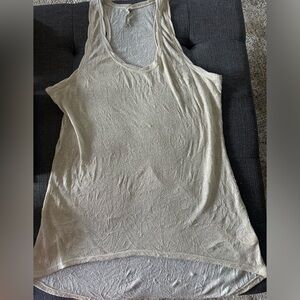 Women’s Free People gold shimmer racerback style tank. Cute summer tank sz.M